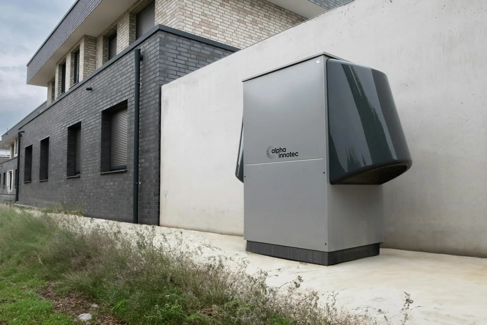 Residential air-source heat pump outdoor unit — the equipment East Alabama homeowners rely on through winter temperatures